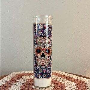 Vibrant Sugar Skull Candle with Blue Floral Design